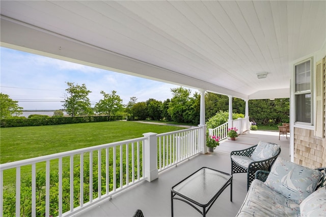 125 Sakonnet Point Rd, Little Compton, RI 02837 - porch featuring a yard
