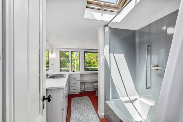 125 Sakonnet Point Rd, Little Compton, RI 02837 - full bath with vanity, toilet, a shower, a bath, and a skylight