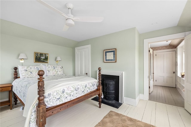 125 Sakonnet Point Rd, Little Compton, RI 02837 - bedroom with light wood-style floors, lofted ceiling, a ceiling fan, and baseboards