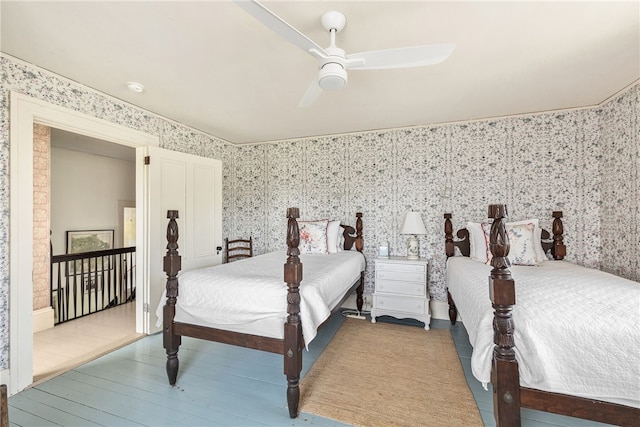 125 Sakonnet Point Rd, Little Compton, RI 02837 - bedroom with wallpapered walls, ceiling fan, and wood finished floors