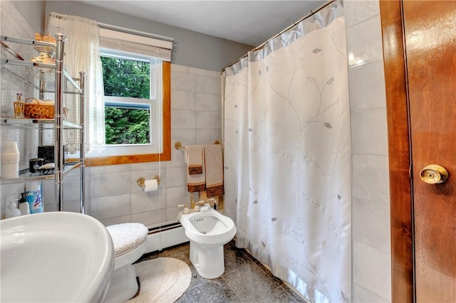 bathroom featuring tile walls, a baseboard heating unit, a shower with shower curtain, and toilet