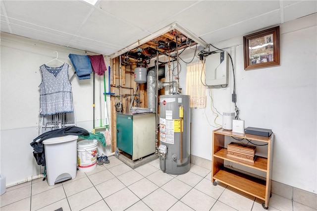 finished basement with gas water heater and a heating unit