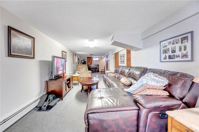 carpeted living area with a baseboard radiator