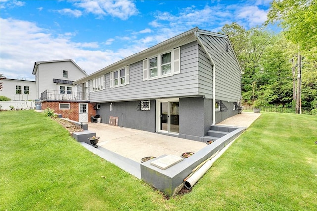 rear view of property with a patio