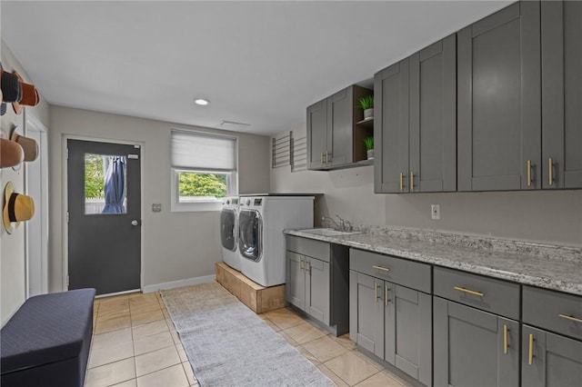 96 Roger Williams Dr, North Kingstown, RI 02852 - washroom featuring cabinet space, separate washer and dryer, baseboards, light tile patterned floors, and recessed lighting