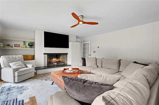 96 Roger Williams Dr, North Kingstown, RI 02852 - living room with ceiling fan, wood finished floors, and a fireplace