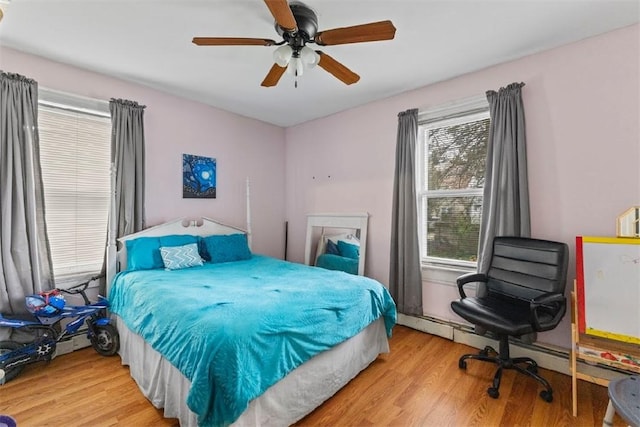 97 Detroit Ave, Providence, RI 02907 - bedroom featuring wood finished floors and a ceiling fan