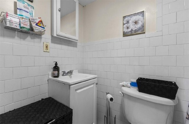 97 Detroit Ave, Providence, RI 02907 - bathroom featuring vanity and tile walls