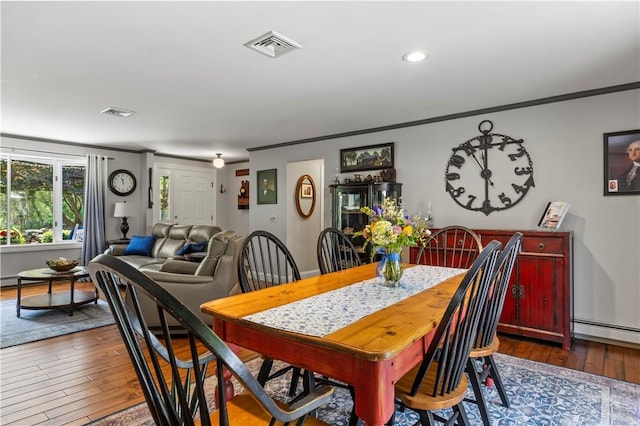 539 Allen Ave, South Kingstown, RI 02879 - dining area featuring crown molding, hardwood / wood-style flooring, recessed lighting, and baseboards