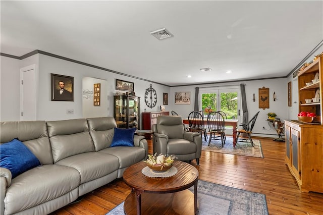 539 Allen Ave, South Kingstown, RI 02879 - living room featuring crown molding, hardwood / wood-style floors, and recessed lighting