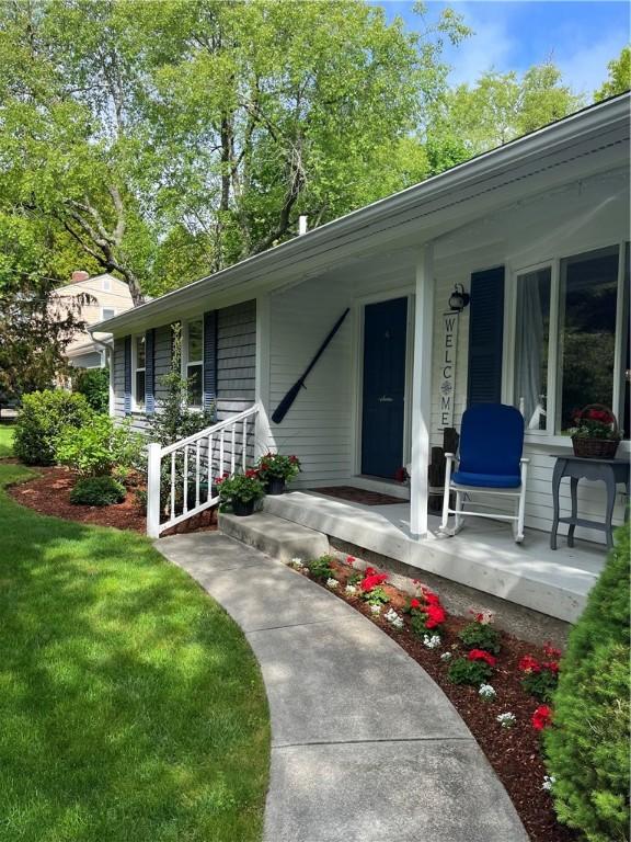 539 Allen Ave, South Kingstown, RI 02879 - doorway to property with a porch and a yard