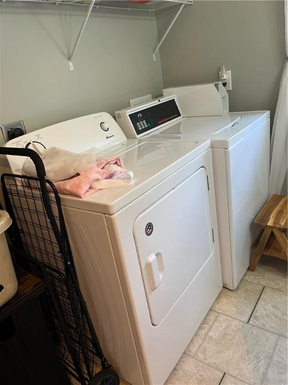 79 Dewey St, Woonsocket, RI 02895 - community laundry with independent washer and dryer and stone finish floors