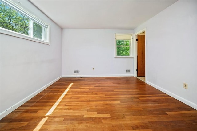 10 Meadowland Dr, North Kingstown, RI 02852 - spare room with wood finished floors and baseboards