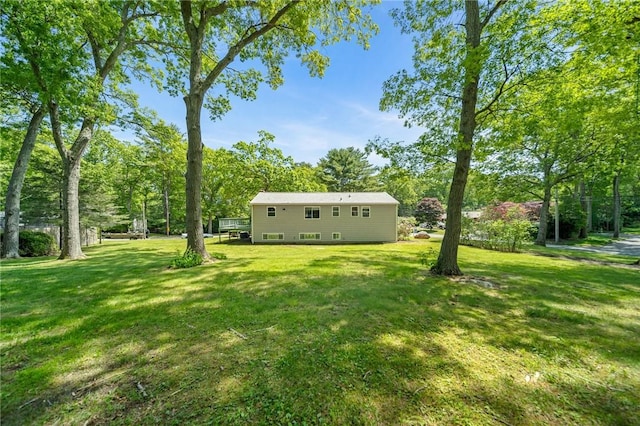 10 Meadowland Dr, North Kingstown, RI 02852 - view of grassy yard featuring view of scattered trees