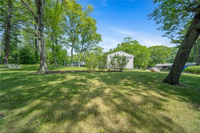 10 Meadowland Dr, North Kingstown, RI 02852 - view of green lawn featuring an outdoor structure