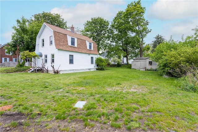 222 Second St, East Providence, RI 02865 - view of green lawn featuring an outbuilding and a storage shed