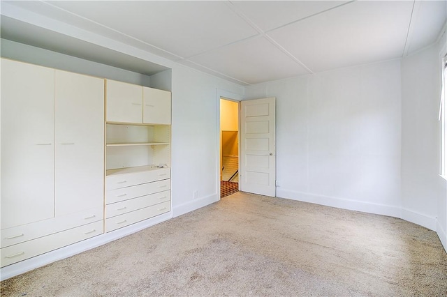 222 Second St, East Providence, RI 02865 - unfurnished bedroom with baseboards and light carpet