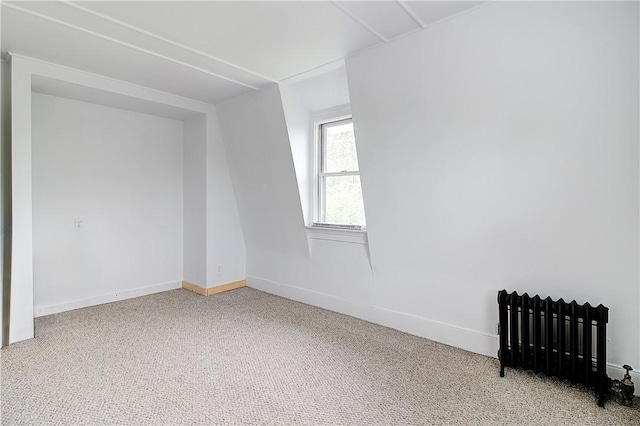 222 Second St, East Providence, RI 02865 - empty room with radiator, light carpet, and baseboards