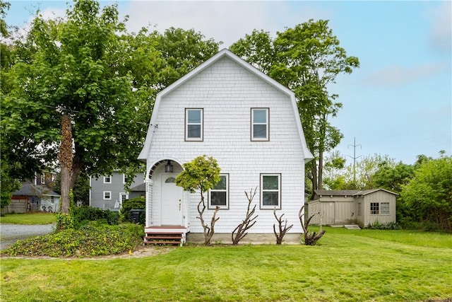 222 Second St, East Providence, RI 02865 - view of front of house featuring a front lawn and a gambrel roof
