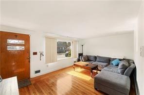 33 Merle St, Warwick, RI 02889 - living area featuring wood finished floors and baseboards
