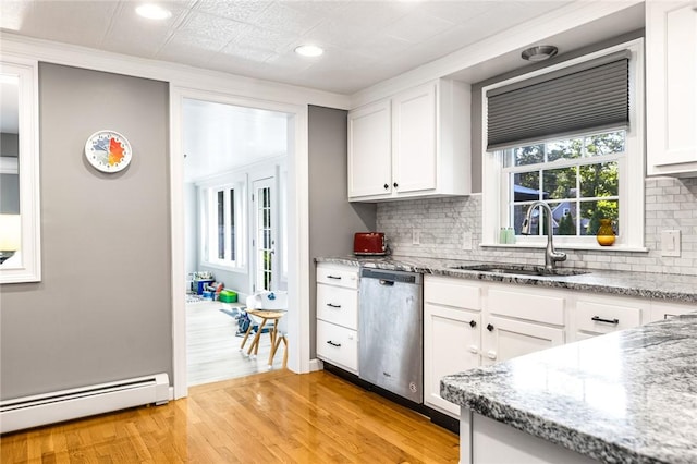 7 Massasoit Ave, Pawtucket, RI 02861 - kitchen with stainless steel dishwasher, a baseboard radiator, a sink, decorative backsplash, and recessed lighting