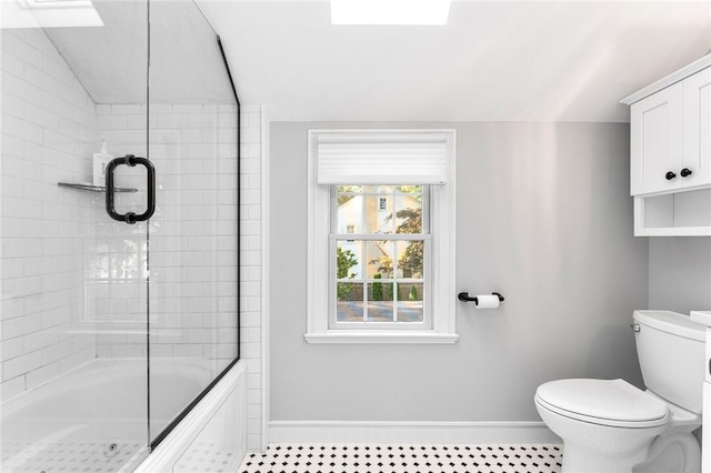7 Massasoit Ave, Pawtucket, RI 02861 - full bathroom featuring baseboards, toilet, vaulted ceiling, tile patterned floors, and bath / shower combo with glass door
