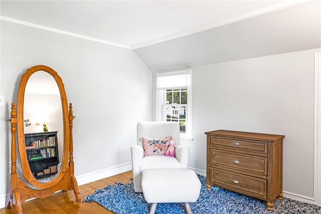 7 Massasoit Ave, Pawtucket, RI 02861 - sitting room with wood finished floors, baseboards, and lofted ceiling