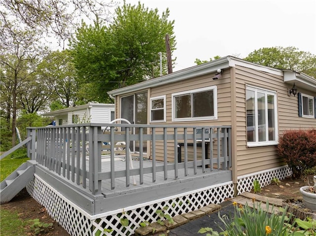 46 E Andrew Comstock Rd, Warwick, RI 02886 - back of house featuring a wooden deck