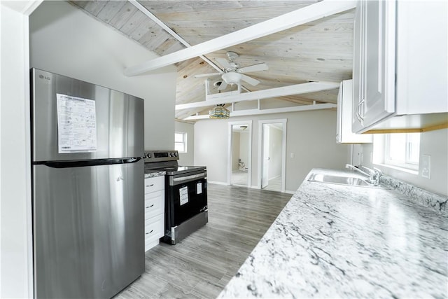 46 E Andrew Comstock Rd, Warwick, RI 02886 - kitchen featuring stainless steel appliances, a sink, white cabinetry, a ceiling fan, and light wood-style floors