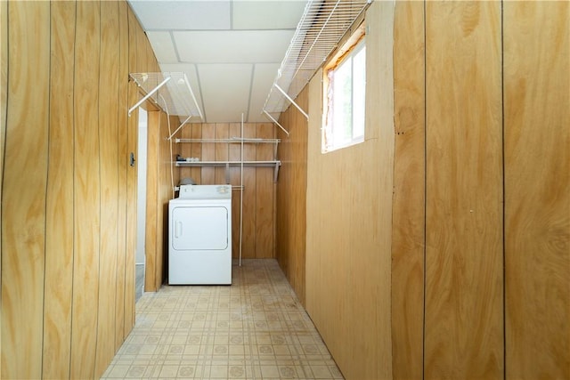 46 E Andrew Comstock Rd, Warwick, RI 02886 - laundry room featuring washer / clothes dryer, light floors, and wooden walls