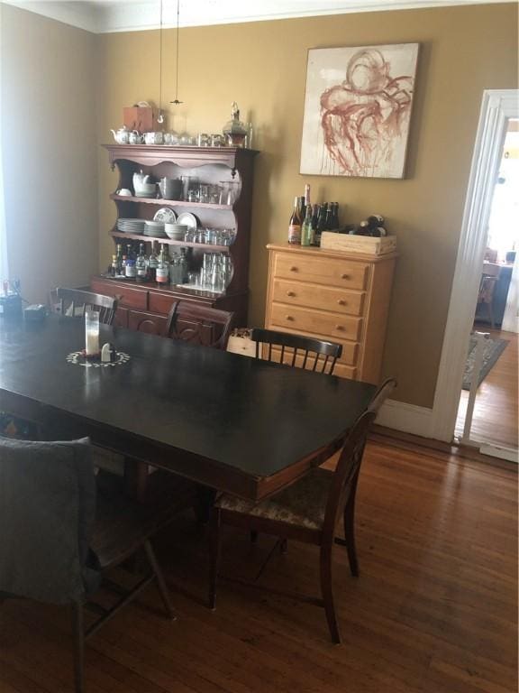 149 Peace St, Providence, RI 05290 - dining area with wood finished floors, baseboards, and ornamental molding