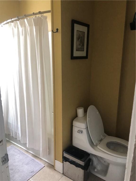 149 Peace St, Providence, RI 05290 - bathroom featuring toilet, shower / tub combo, and tile patterned floors