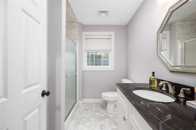 1351 Pippin Orchard Rd, Cranston, RI 02921 - full bathroom featuring a stall shower, vanity, baseboards, tile patterned floors, and toilet