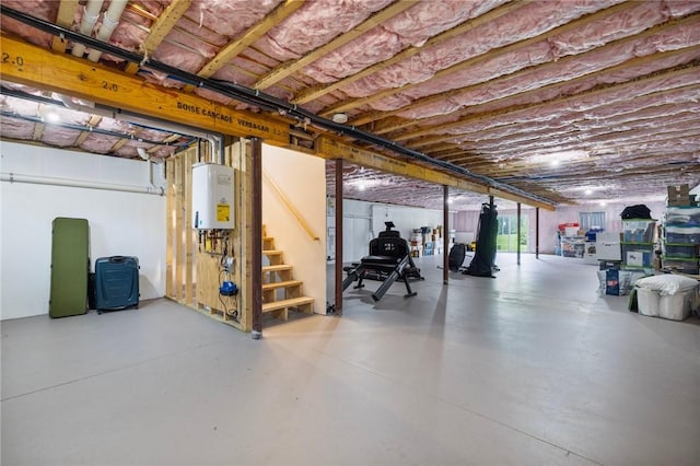 1351 Pippin Orchard Rd, Cranston, RI 02921 - below grade area featuring tankless water heater and stairway