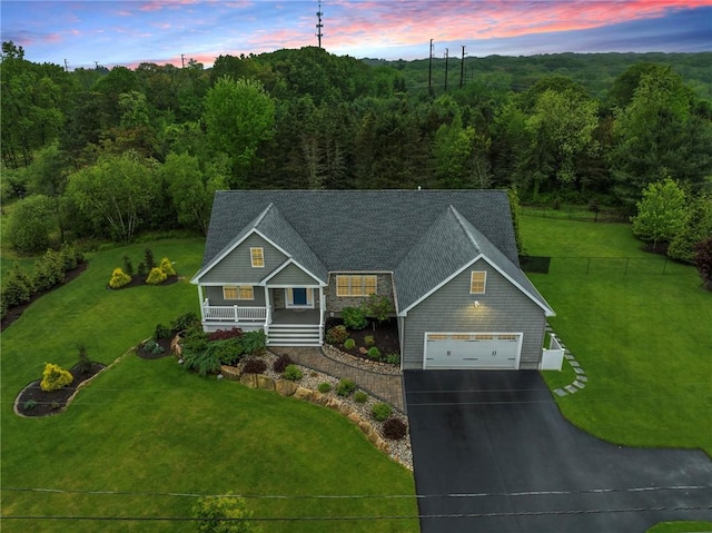 1351 Pippin Orchard Rd, Cranston, RI 02921 - view of front of house with covered porch, driveway, a lawn, and a garage