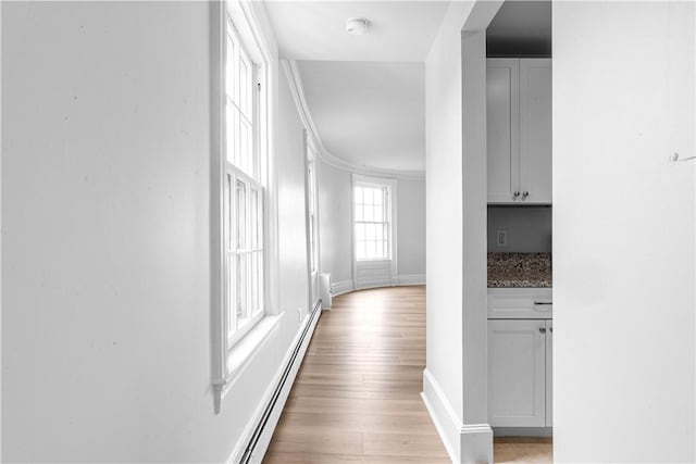 217 Hope St Unit 3, Bristol, RI 02809 - corridor featuring light wood-style flooring and baseboards
