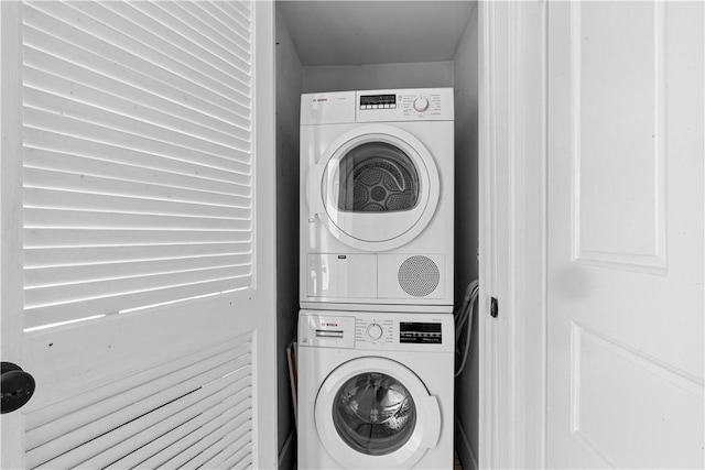 217 Hope St Unit 3, Bristol, RI 02809 - clothes washing area featuring stacked washing machine and dryer