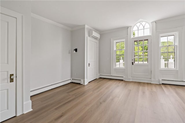 217 Hope St Unit 3, Bristol, RI 02809 - unfurnished bedroom with a wall mounted AC, a baseboard radiator, light wood-style floors, crown molding, and baseboard heating