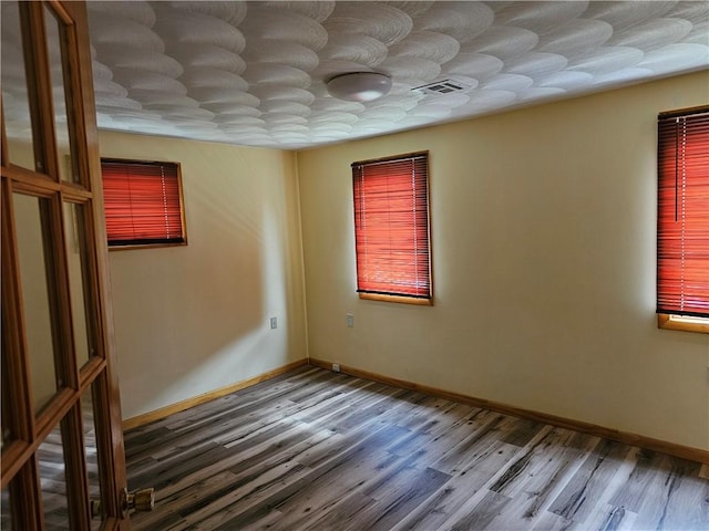 121 Friendship St, North Providence, RI 02904 - unfurnished room featuring wood finished floors and baseboards