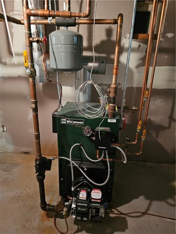 121 Friendship St, North Providence, RI 02904 - utility room with a heating unit