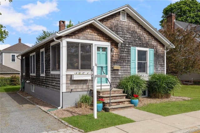 10 Curry Ave, Newport, RI 02840 - view of front of house with a chimney