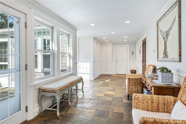 15 Rumstick Dr, Barrington, RI 02806 - entryway with stone tile floors, plenty of natural light, a decorative wall, recessed lighting, and wainscoting