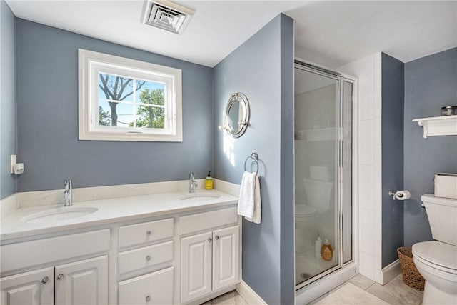 15 Rumstick Dr, Barrington, RI 02806 - bathroom featuring toilet, a stall shower, double vanity, and baseboards
