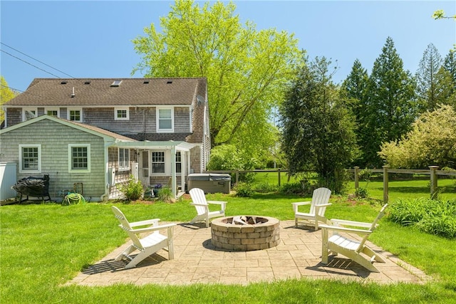 15 Rumstick Dr, Barrington, RI 02806 - rear view of property featuring a hot tub, an outdoor fire pit, and a patio area