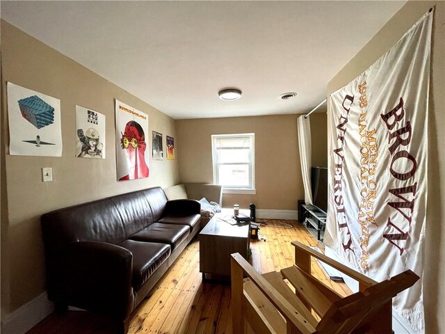 185 Williams St, Providence, RI 02906 - living room featuring hardwood / wood-style flooring and baseboards