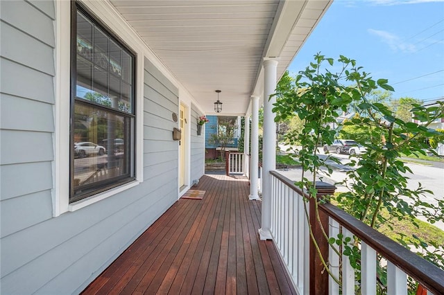 wooden deck featuring covered porch
