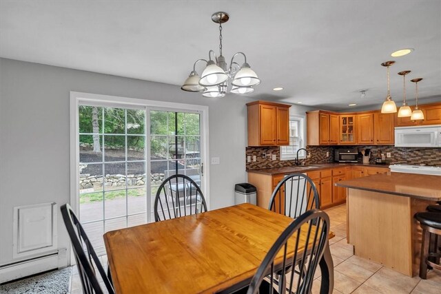 23 Blissdale Ave, Cumberland, RI 02864 - dining room featuring baseboard heating, a chandelier, light tile patterned flooring, and recessed lighting