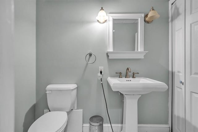 23 Blissdale Ave, Cumberland, RI 02864 - bathroom featuring toilet, baseboards, and a closet