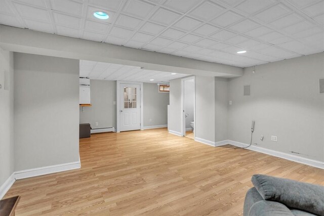 23 Blissdale Ave, Cumberland, RI 02864 - unfurnished living room with baseboards, light wood-type flooring, recessed lighting, and a baseboard radiator