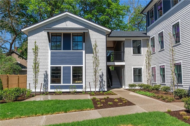 32 Exchange St Unit 101, East Greenwich, RI 02818 - view of front of home featuring stairs and fence